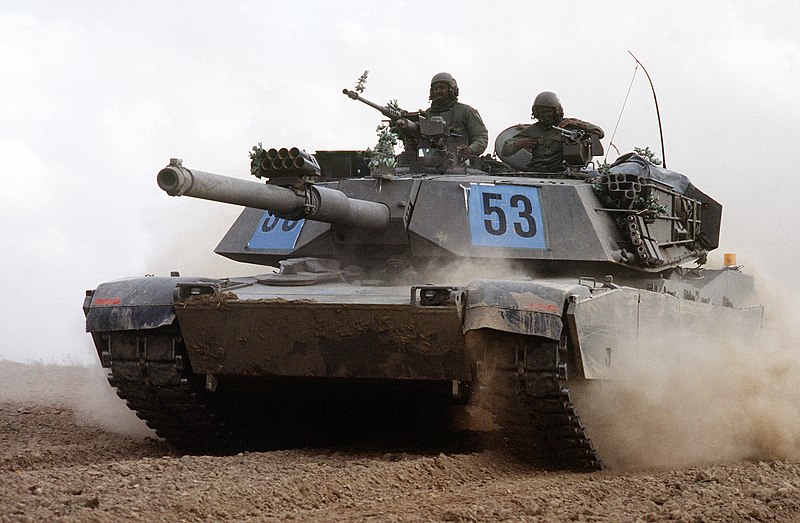 Файл:A U.S. Army M1 Abrams tanks kicks up a cloud of dust in the German countryside while participating in REFORGER '82, the multi-national military training exercise.jpg